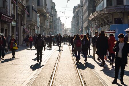ISTANBUL, TURKEY - DECEMBER 28, 2018: Peoples walking in Taksim Istiklal Street. Taksim Istiklal Street is a popular destination in Istanbul. Beyoglu, Taksim, Istanbul. Turkey.のeditorial素材