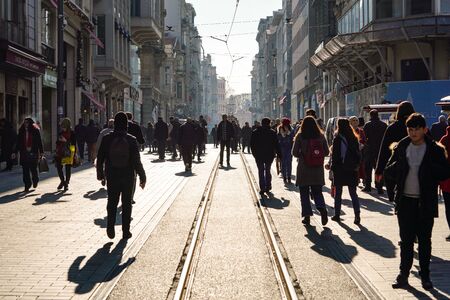 ISTANBUL, TURKEY - DECEMBER 28, 2018: Peoples walking in Taksim Istiklal Street. Taksim Istiklal Street is a popular destination in Istanbul. Beyoglu, Taksim, Istanbul. Turkey.のeditorial素材