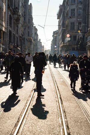 ISTANBUL, TURKEY - DECEMBER 28, 2018: Peoples walking in Taksim Istiklal Street. Taksim Istiklal Street is a popular destination in Istanbul. Beyoglu, Taksim, Istanbul. Turkey.のeditorial素材