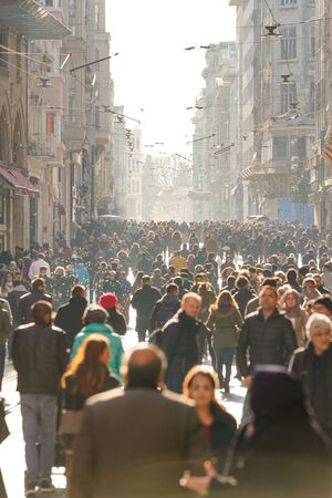 ISTANBUL, TURKEY - DECEMBER 28, 2018: Peoples walking in Taksim Istiklal Street. Taksim Istiklal Street is a popular destination in Istanbul. Beyoglu, Taksim, Istanbul. Turkey.のeditorial素材
