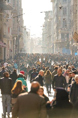 ISTANBUL, TURKEY - DECEMBER 28, 2018: Peoples walking in Taksim Istiklal Street. Taksim Istiklal Street is a popular destination in Istanbul. Beyoglu, Taksim, Istanbul. Turkey.のeditorial素材