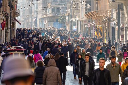 ISTANBUL, TURKEY - DECEMBER 28, 2018: Peoples walking in Taksim Istiklal Street. Taksim Istiklal Street is a popular destination in Istanbul. Beyoglu, Taksim, Istanbul. Turkey.のeditorial素材