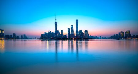 Shanghai city skyline, view of the skyscrapers of Pudong and huangpu River. China.のeditorial素材