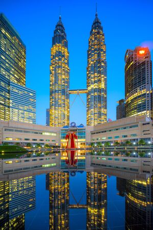 KUALA LUMPUR, MALAYSIA - FEBRUARY 19, 2018:.The Petronas Twin Towers in kuala Lumpur and the KLCC Park, Malaysia. The building were the tallest buildings (452m) in the worldのeditorial素材