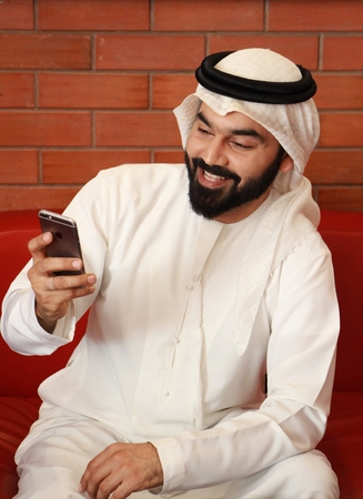 arab man using mobile phoneの写真素材