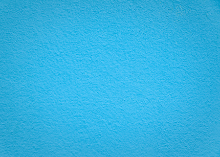 Blue cement wall texture background rough surface and gradation middle to edgeの写真素材