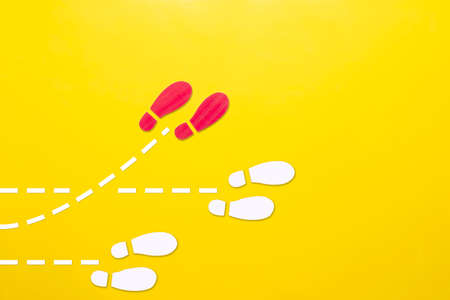 Foot print paper cut walk out sid normal way for new thing best more.change to chance method success concept.の写真素材