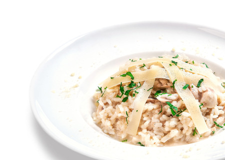 rice and stew of meat with sauce and noodles from above in the plate on white backgroundの写真素材
