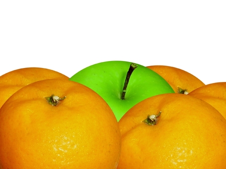 apple and oranges closeup on whiteの写真素材