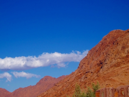 blue sky and rocky hillの写真素材