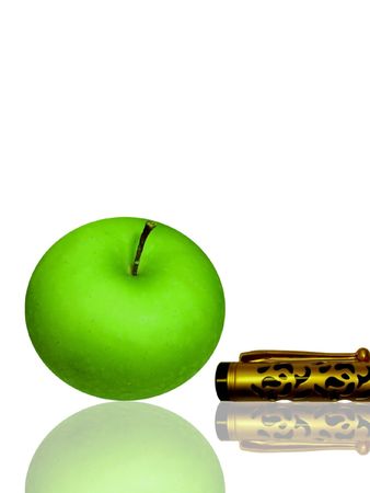 juicy apple and golden pen on whiteの写真素材