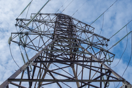 high voltage pillar and wires with sky backgroundの写真素材