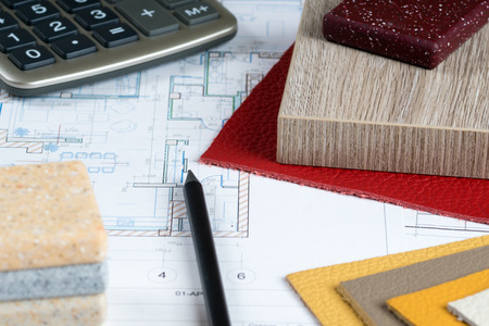interior project with material samples, pencil and calculatorの写真素材
