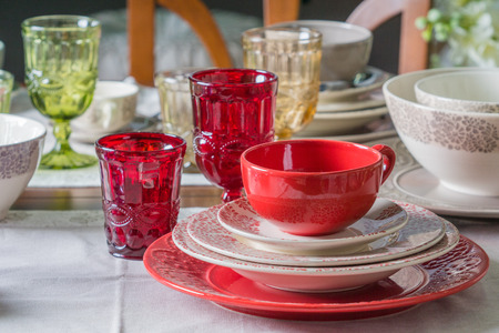 red country styled plates, cup and wineglasses setの写真素材