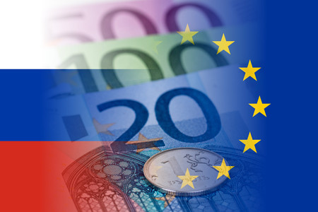 russia and eu flags with euro banknotes and ruble coin mixed imageの写真素材