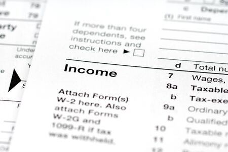 income, part of tax return form, close up shotの写真素材