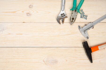 hand tools on wooden planksの写真素材