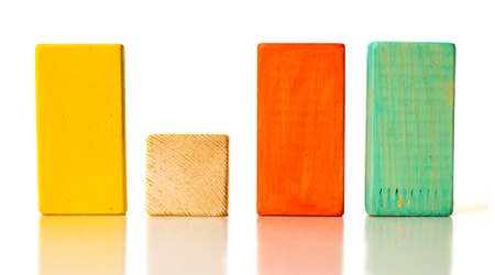 different wooden blocks on white background, leadership and team conceptの写真素材