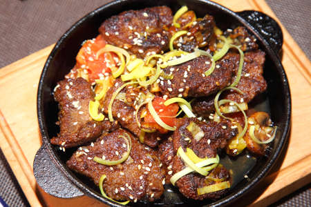 Fried beef liver with onions. Beer pub. Sports bar.の写真素材