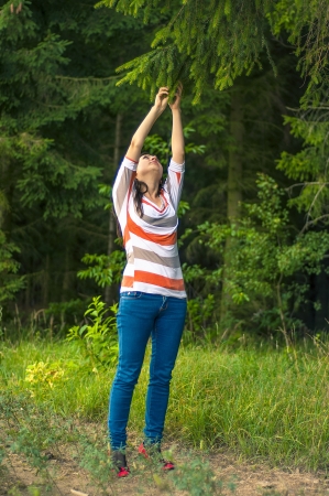 Outdoors portrait of beautiful young brunette girlの写真素材