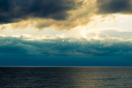 An image of storm clouds over the seaの写真素材