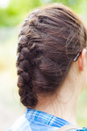 An image of brunette girl having a plaitの写真素材