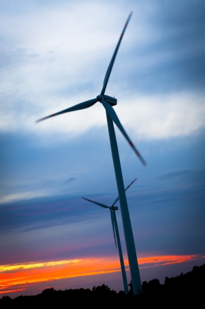 Windmills during sunset in summer timeの写真素材