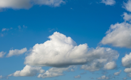 White clouds against blue skyの写真素材