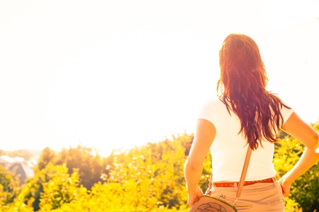 An image girl walking through the forest pathwayの写真素材