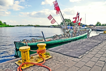 An image of boat docked at the wharfの写真素材