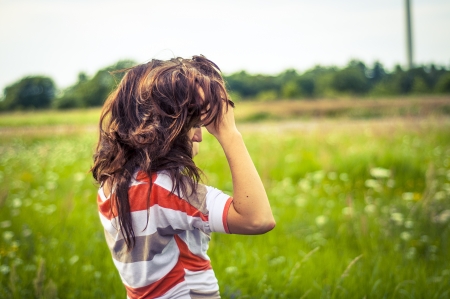 Outdoors portrait of beautiful young brunette girlの写真素材