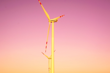 An image of windturbines at duskの写真素材