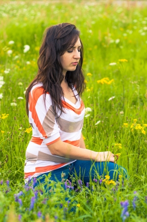 Outdoors portrait of beautiful young brunette girlの写真素材