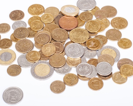 An image of polish zloty coins on whiteの写真素材