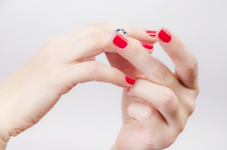 An image of Girl looking at engagement ringの写真素材