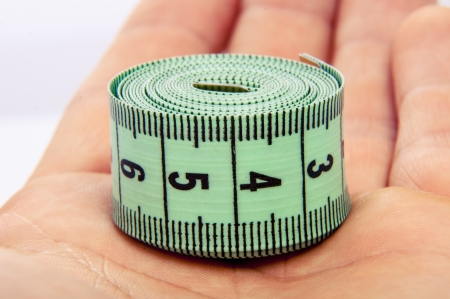 An image of green centimeter on white backgroundの写真素材