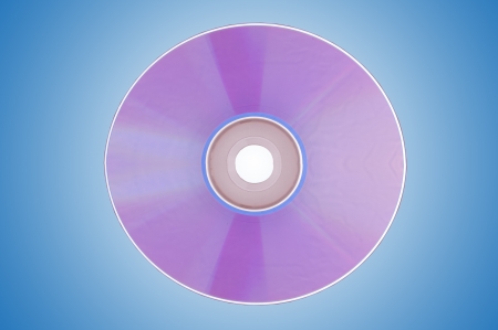 An image of compact disc on blue backgroundの写真素材
