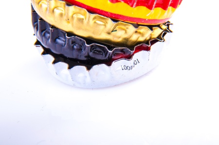 An image of beer bottle cap isolated on whiteの写真素材