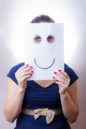 An image of businesswoman holding paper with drown emotionsの写真素材