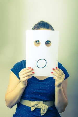 An image of businesswoman holding paper with drown emotionsの写真素材