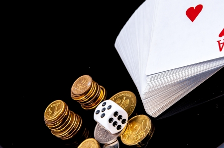 An image of playing cards, dice and moneyの写真素材