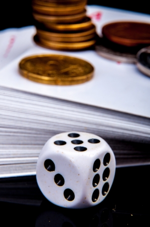 An image of playing cards, dice and moneyの写真素材