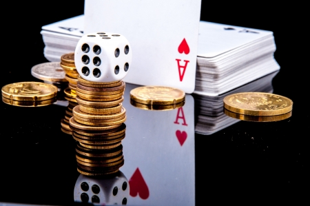 An image of playing cards, dice and moneyの写真素材