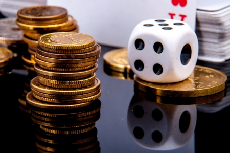 An image of playing cards, dice and moneyの写真素材