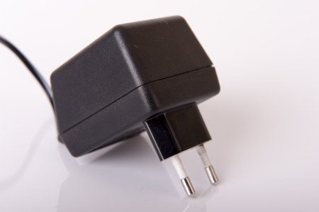 An image of black charger isolated on whiteの写真素材