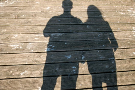 tourists walking on the beachの写真素材