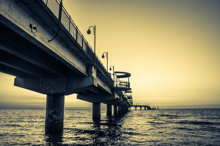 Pier in Miedzyzdroje at sunset, Poland