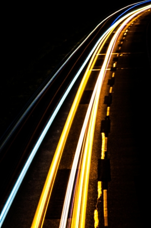 An image of Car lights on a highway at nightの写真素材