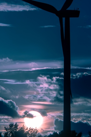 An image of wind turbines at sunsetの写真素材