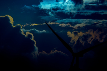 An image of wind turbines at sunsetの写真素材
